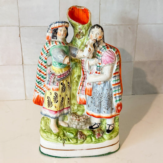 Antique English Staffordshire Spill Vase Decorated With a Scottish Man and Woman, Circa 1860