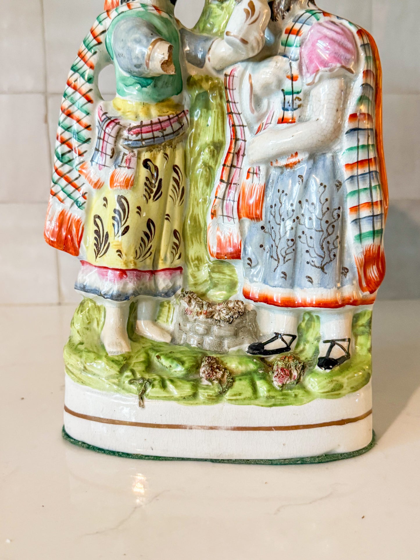 Antique English Staffordshire Spill Vase Decorated With a Scottish Man and Woman, Circa 1860