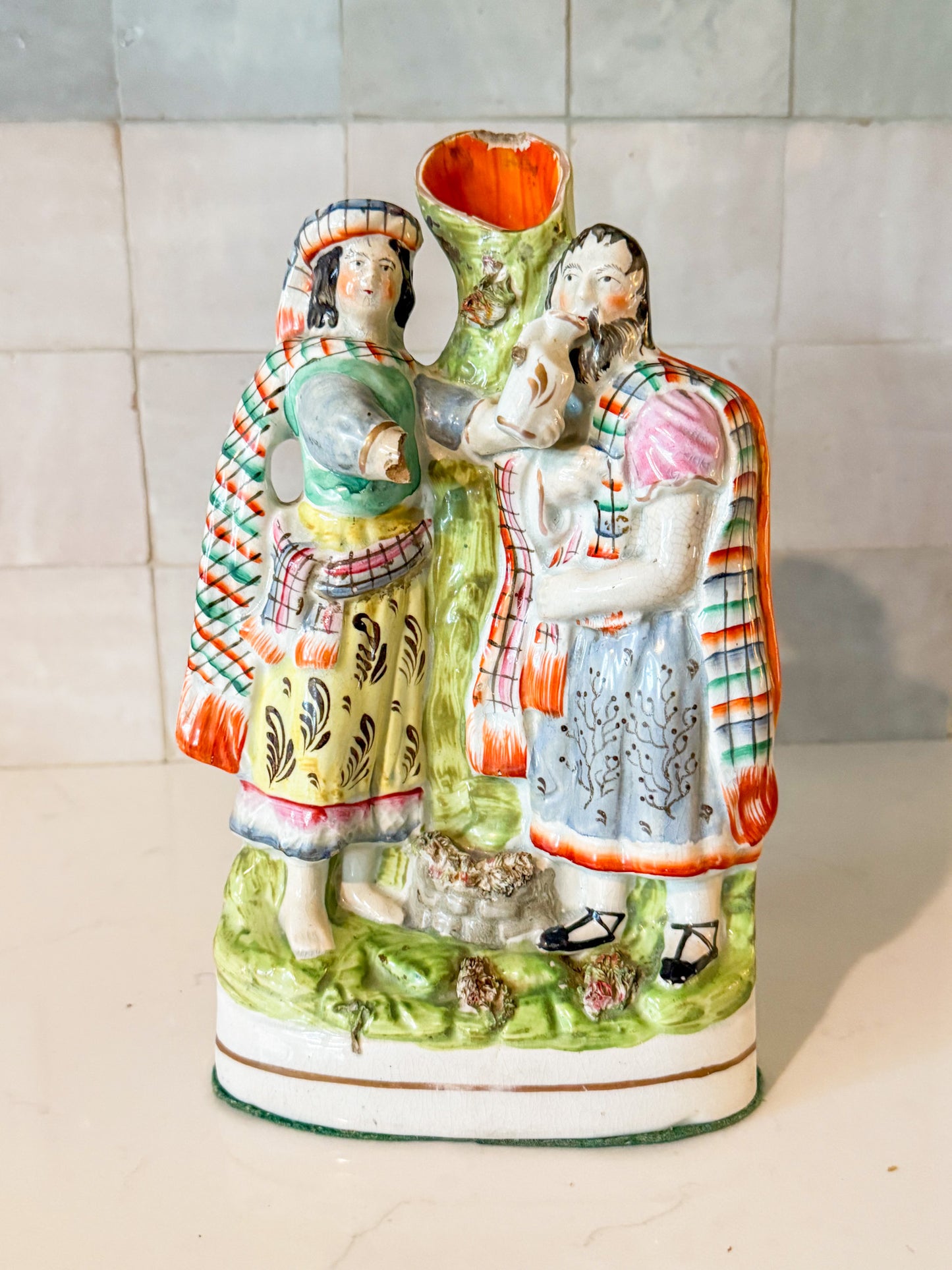 Antique English Staffordshire Spill Vase Decorated With a Scottish Man and Woman, Circa 1860