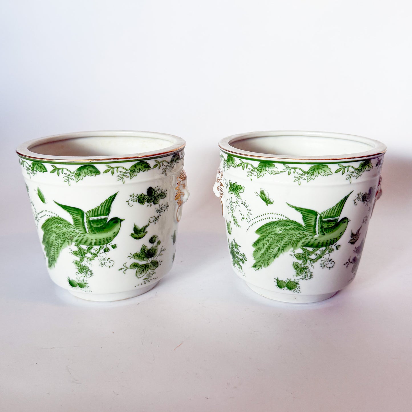 Mid Century Pair of Porcelain Green Bird Cache Pot Planters With Lions Heads