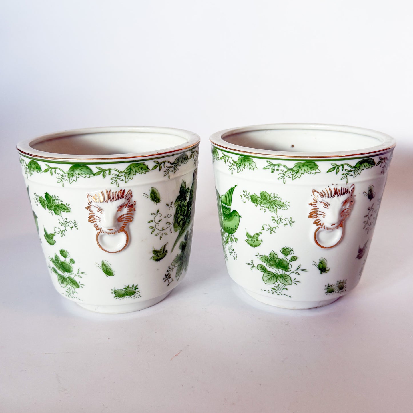 Mid Century Pair of Porcelain Green Bird Cache Pot Planters With Lions Heads