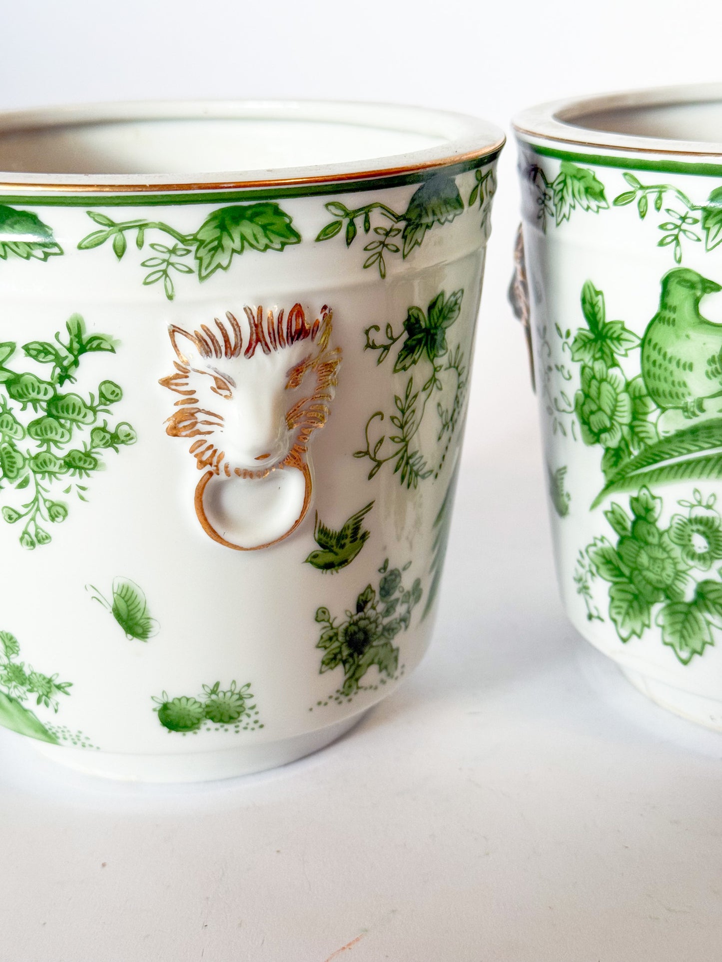 Mid Century Pair of Porcelain Green Bird Cache Pot Planters With Lions Heads